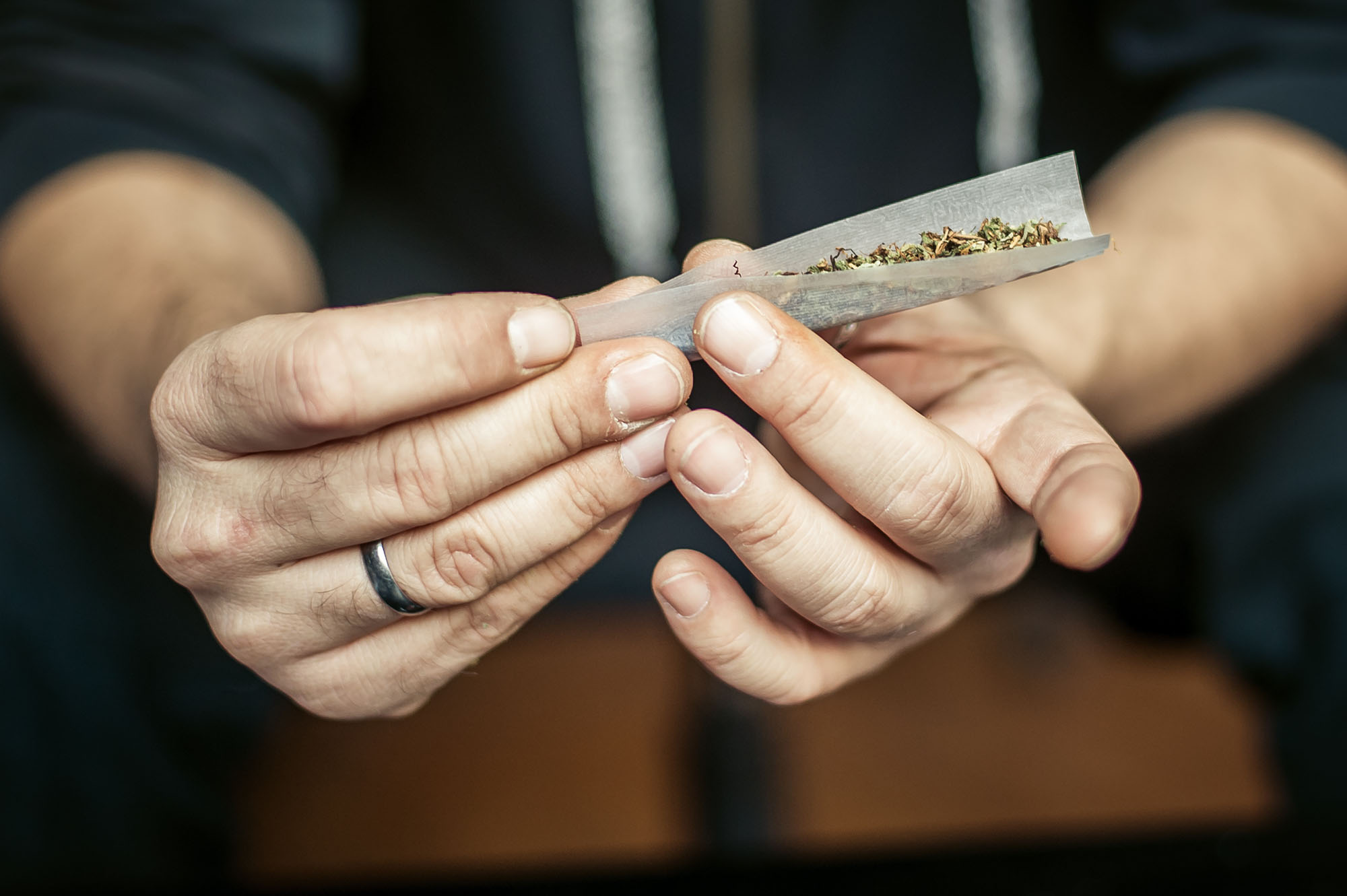 Preparing and rolling cannabis joint